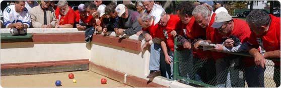Spectators watch a bocce tournament