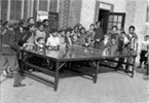 Children play ping-pong in 1945 in Mount Morris Park, renamed Marcus Garvey Park in 1973.