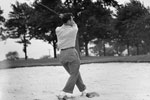 Golfer swinging a club
