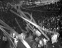 Image of New Year's Eve dancers wear ponchos to protect themselves from harsh weather on December 31, 1969.