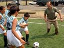 thumbnail photo of Commissioner Benepe playing soccer in Flushing Meadows Corona Park, Queens links to photo journal 5/22/02 through 7/9/02