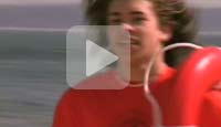 Lifeguard running on the beach