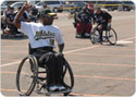 Man playing wheechair softball