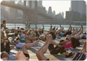 People taking a fitness class in a park