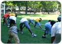 Young people exercising in a playground area