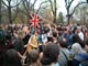 Image of Beatles fans gather at the Imagine mosaic to pay tribute to the late George Harrison the day after his death on November 29, 2001.  Photo by S.T. Tucker