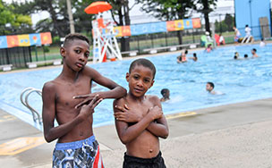 kids posing in front of West Brighton Cool Pool