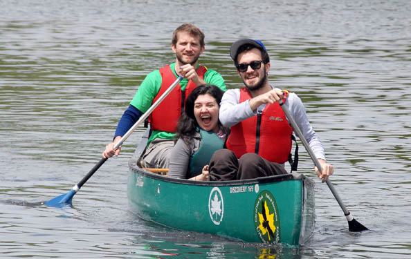 guests enjoy paddling in a canoe